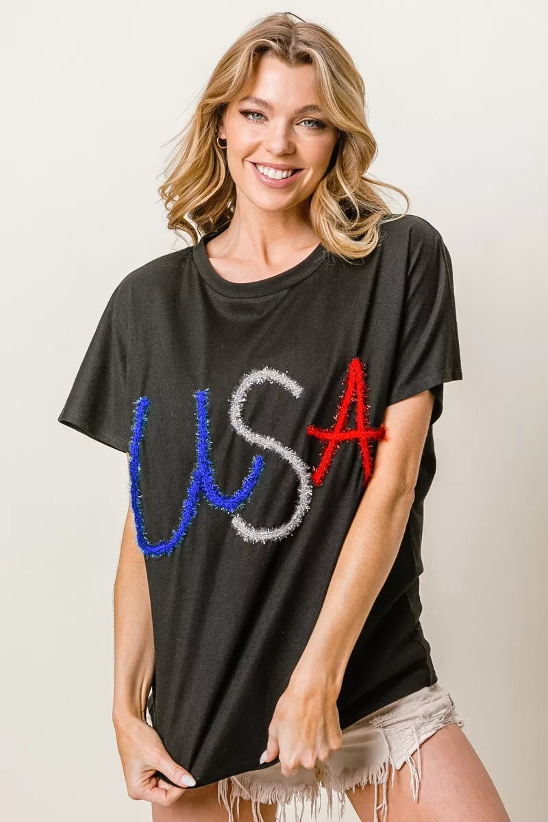 BiBi Metallic Letter Short Dolman Sleeve Top - Lee's Retail