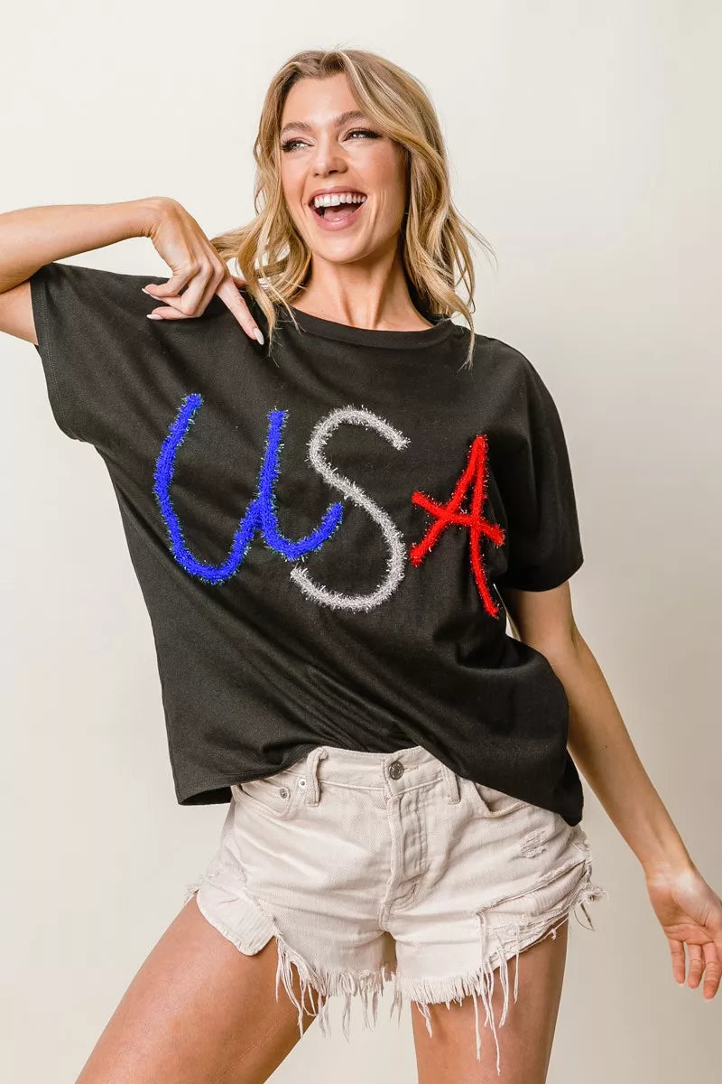 BiBi Metallic Letter Short Dolman Sleeve Top - Lee's Retail