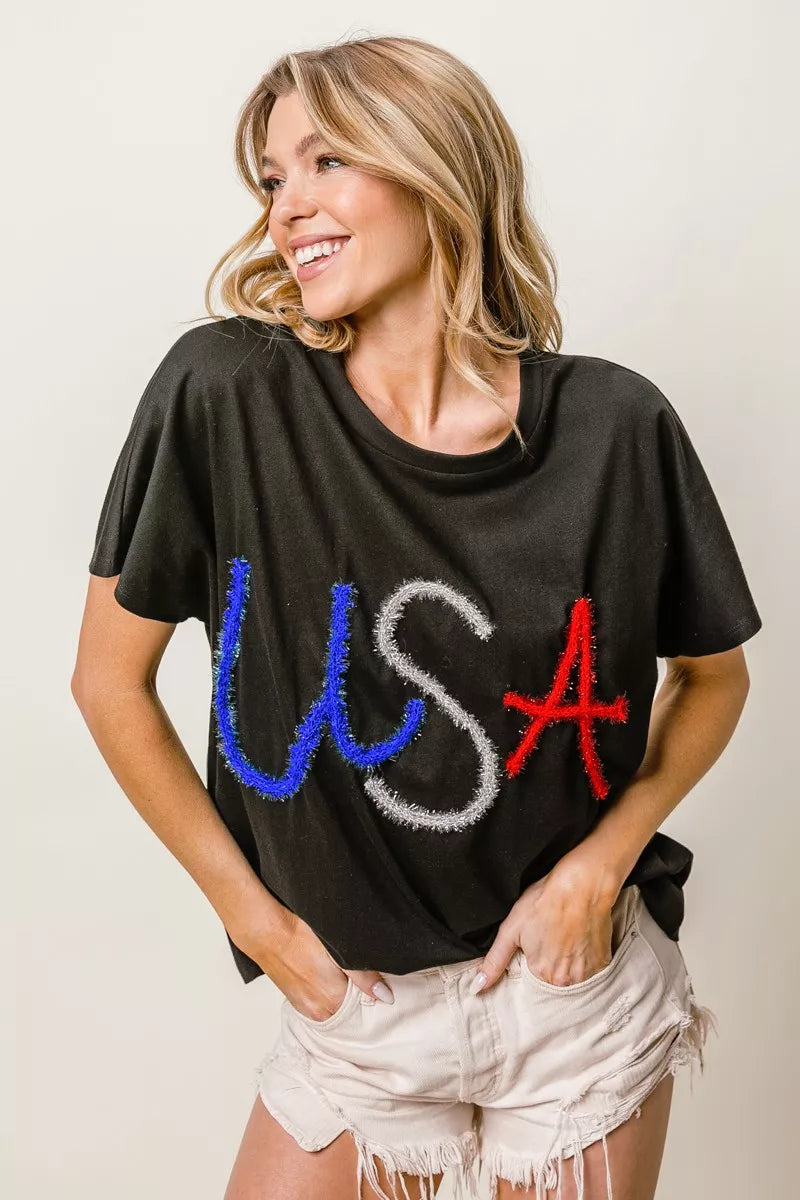 BiBi Metallic Letter Short Dolman Sleeve Top - Lee's Retail